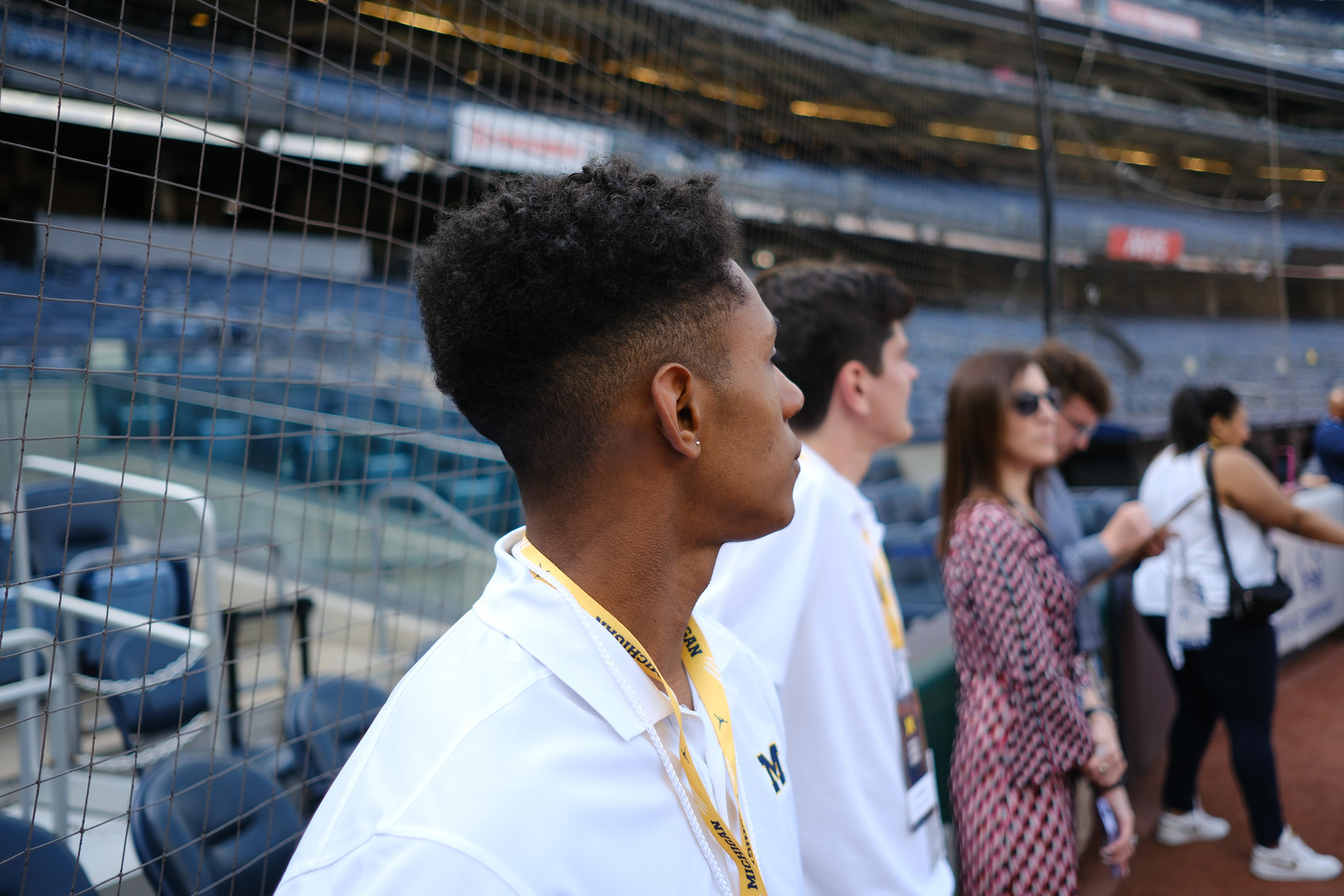 Visitors taking in the view from a baseball stadium